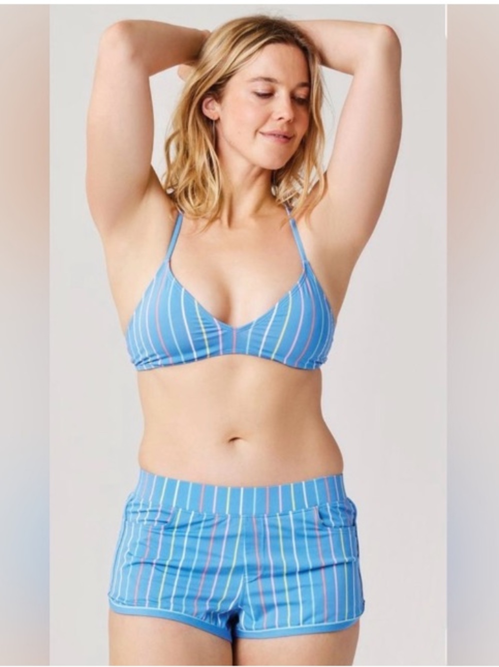 Carve Designs / women’s Lorenzo swim Short in blue and pink stripes.